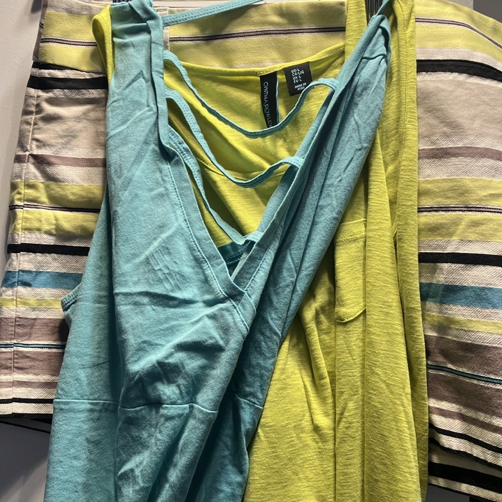 Shorts and two matching sleeveless shirts